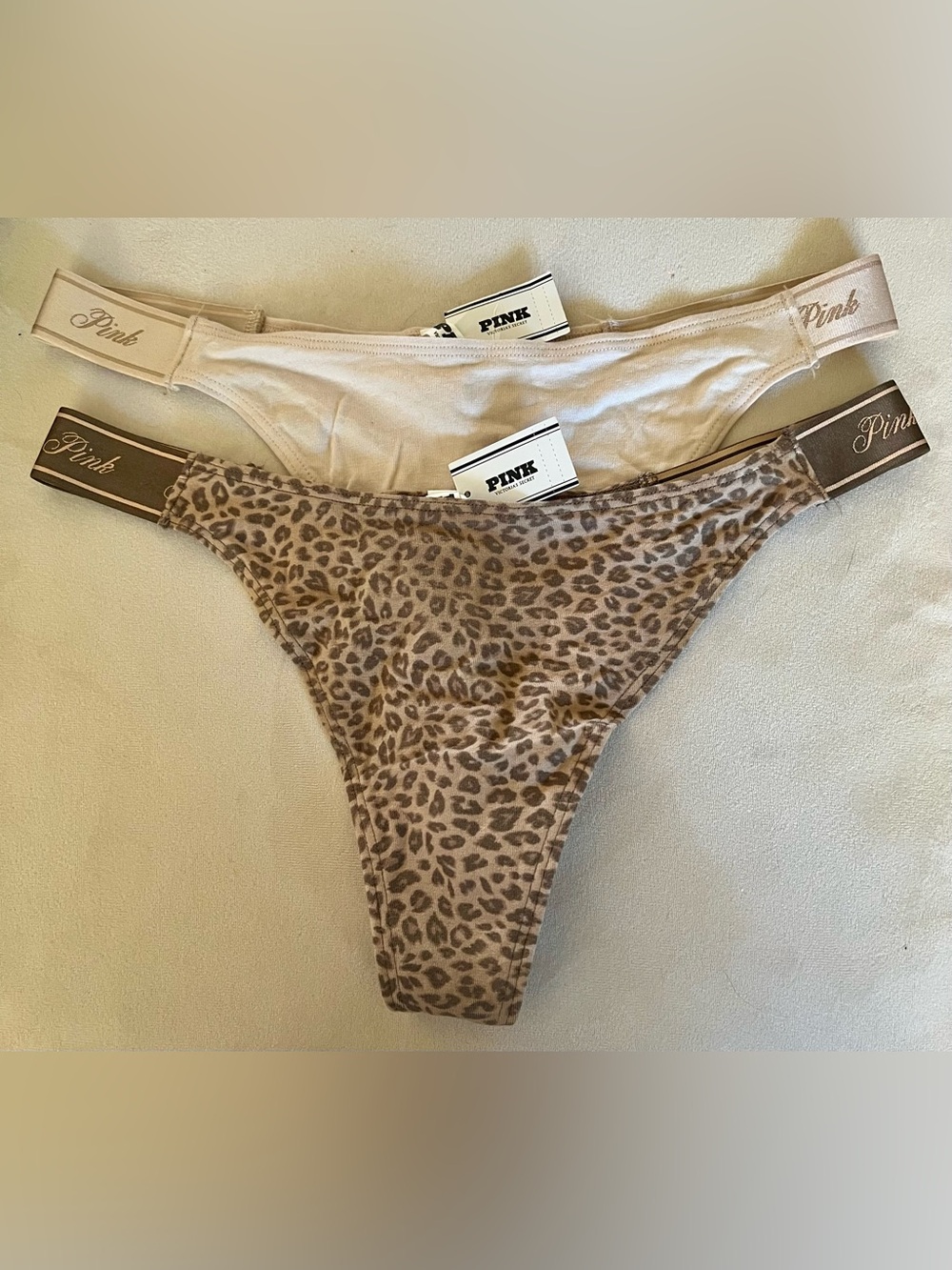 2 NWT Victoria’s Secret thong panties, Size large.